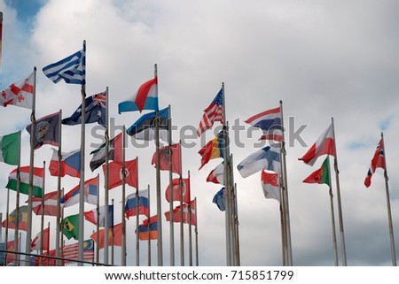 Flags from different countries around the world fluttering