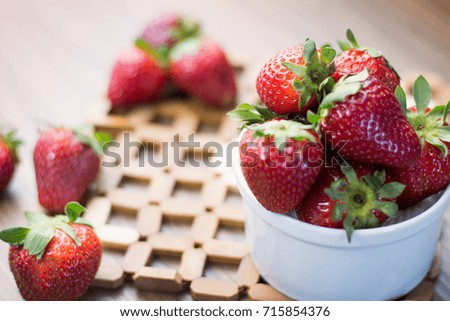 Fresh strawberries on a wooden table