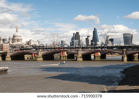 London City Skyline near Southwark Bridge over the River Thames