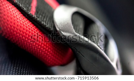 Open band strap of a bag in close up view.