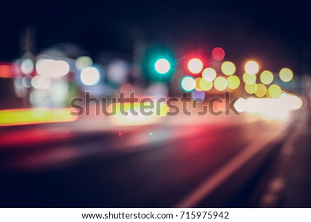 Abtract bokeh background , bokeh lights on the traffic road at night , vintage or retro color