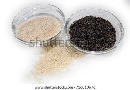 Bowls of basmati and wild rice Royalty-Free Stock Photo #716010676