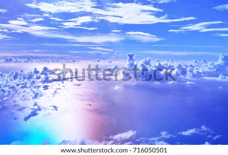 Rainbow color shining on the sea as seen from the plane (aerial shooting)