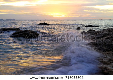 Rocky beach at sunset