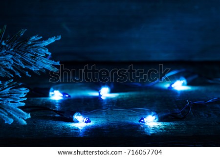 Christmas bulb lights in night abstract background