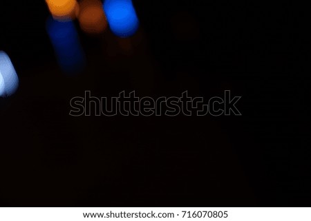 Light night at city blue bokeh abstract background blur lens flare reflection beautiful circle glitter lamp street with dark sky festival firework