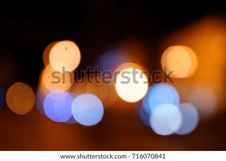 Light night at city blue bokeh abstract background blur lens flare reflection beautiful circle glitter lamp street with dark sky festival firework