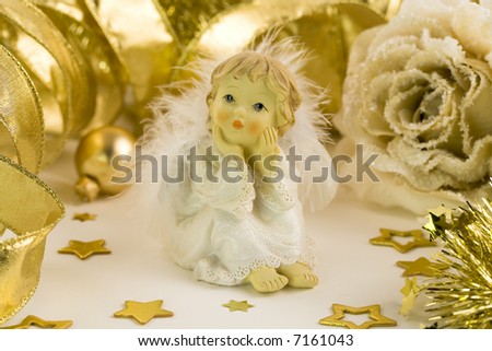 Little angel and Christmas decorations