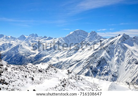 Landscape of beautiful slopes of the Caucasus Mountains, Elbrus Royalty-Free Stock Photo #716108647
