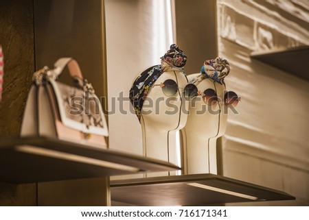 Elegant accesories in a storefront in Paris.