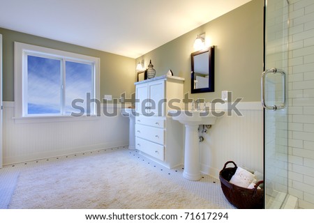 Luxury bathroom with iron tub and walk-in shower