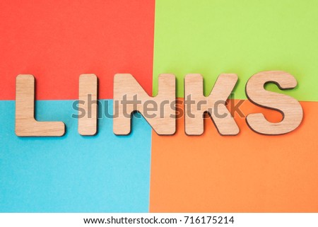 Links in search engine optimization SEO concept photo. 3D letters form word Links means backlinks and hyperlink in web, part of Internet marketing in 4 colors background : blue, green, orange and red