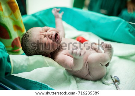 new born baby Royalty-Free Stock Photo #716235589