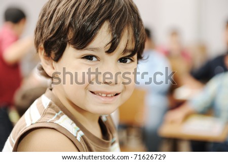 school boy is smiling