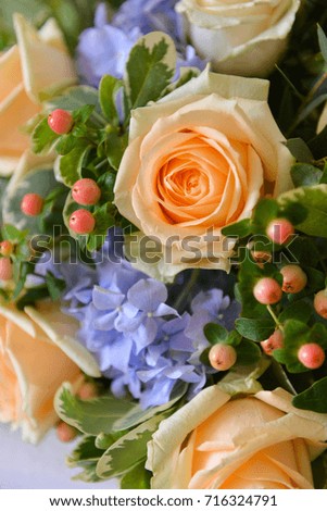 floral composition with a yellow roses