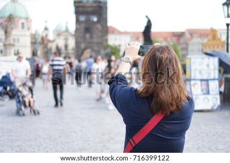women taking photo 