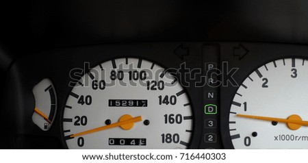The fuel level gauge of the car shows the low oil on the instrument panel.