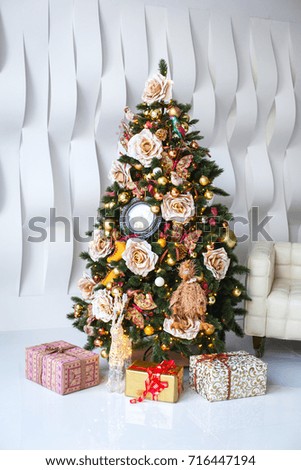 christmas room interior tree decorated by lights gifts toys candles holiday concept