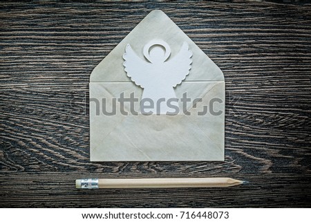 Vintage envelope angel pencil on black board