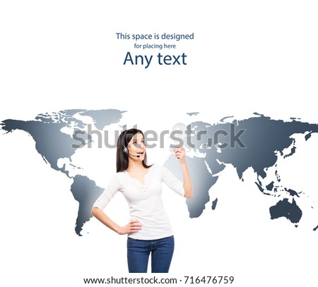 Call center operator working in a hot line office. Customer support and a global business concept. World map background.