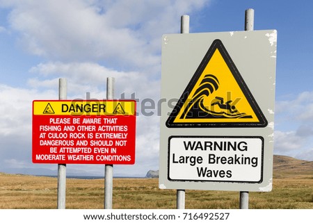 Warning signs large breaking waves 