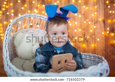 Little boy in bunny ears