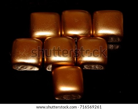 Gold bars of gold on a black background
