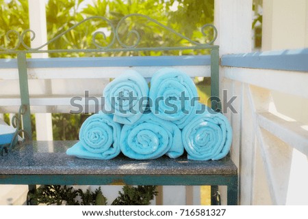 Spa setting towels and Outdoor summer background.