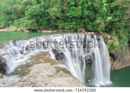 a majestically beautiful shifen waterfall in Taiwan