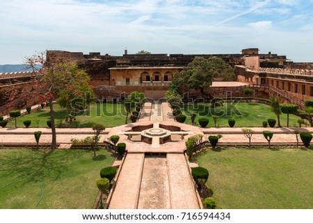 Front picture of the courtyard with trees at Jaigarh Fort on the top of the mountains of Jaipur, known as pink city in India.