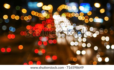 Abstract colorful bokeh light of the car background.