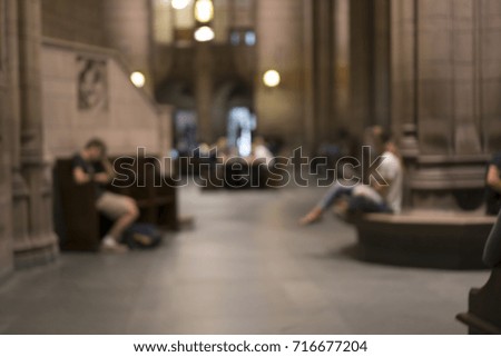 Blurry image of college students studying between classes for background use