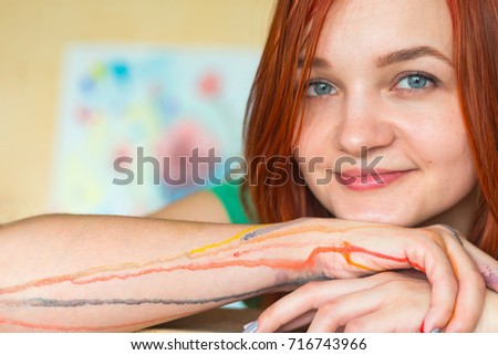Beautiful smiling woman painter portrait. Close up. Copy space.