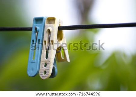  plastic cloth clamp, hanging on rope (on the clothes rail)