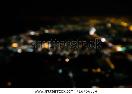 abstract bokeh of lighting city and building.  see form plane in night time at Japan.