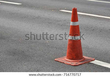 traffic cone in the street  with pavement background