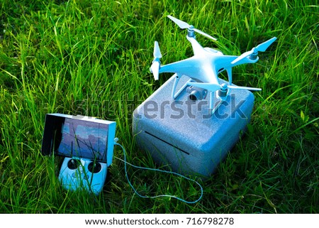 Hobby aerial photography. A drone on the grass.