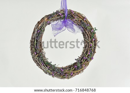Decorative floral wreath with lavender flowers on white background. 
