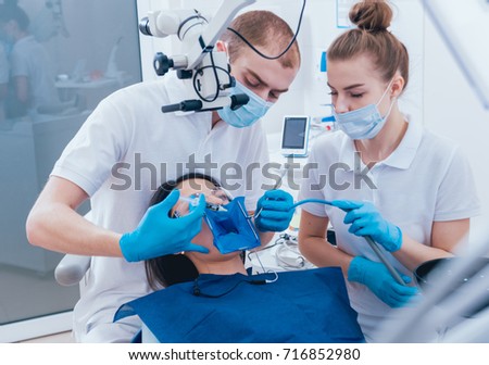 Medicamentous treatment of root canals during endodontic treatment. Modern technology Royalty-Free Stock Photo #716852980