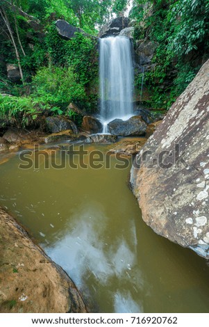 Beautiful waterfall in green forest in jungle, Thailand