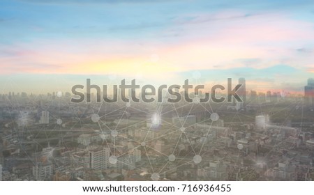 Networking connect technology abstract concept. Polygonal with connecting dots with blur city business background.


