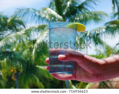 cold drink on a hot day at the pool