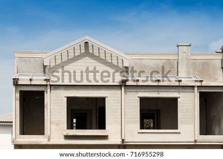Prefabricated building isolated on blue sky background.