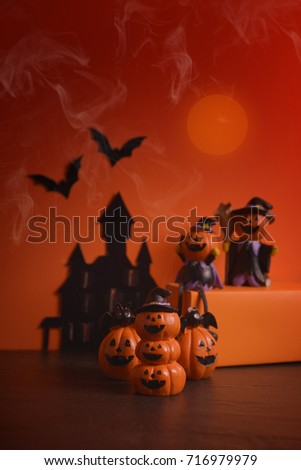 Halloween pumpkins jack-o-lantern on orange background. Happy Halloween. 
