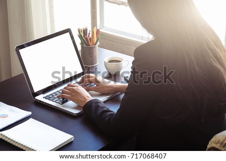 blank laptop screen mock up.laptop screen for advertising,working on desk concept,successful business woman working,portable device and gadget accessories