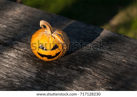 halloween jack-o-lantern on a old brown background