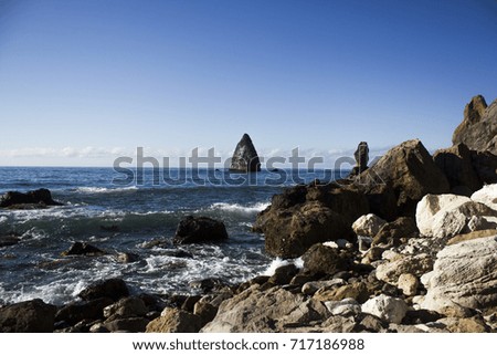 Nature ocean fantastic landscape outdoor of mountains in the ocean on the wild stone coast of a tropical island