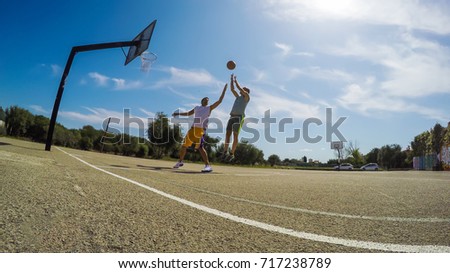 Fade away shot in a one on one basketball game