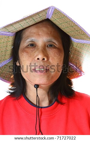 Portrait of a 50s Senior Asian Woman wearing hat isolated on white background