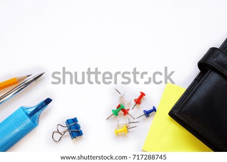 writing supplies and diary. on a white background